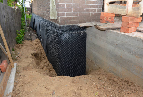 Happy homeowners after waterproofing job in Avenue